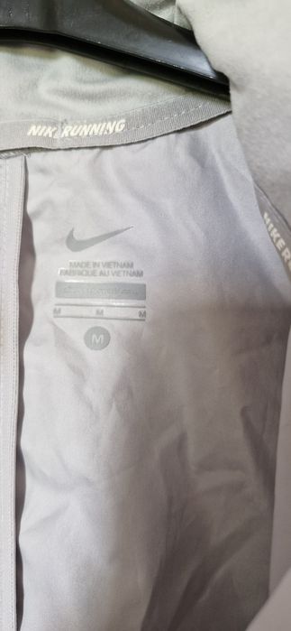 Kurtka wiatrowka dziewczęca NIKE RUNNING rozmiar  M.
