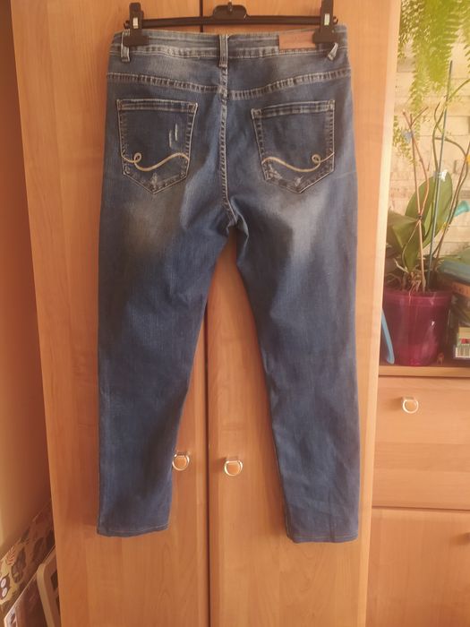 Spodnie dżinsy jeansy bawełniane z rozdarciami elastyczne r 42 XL