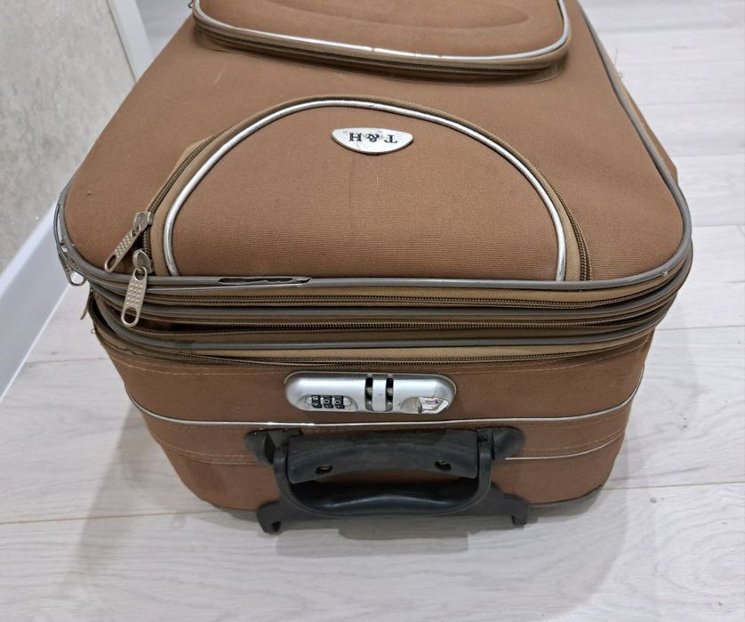 Чемодан,  сумка на колесах, валіза на колесах