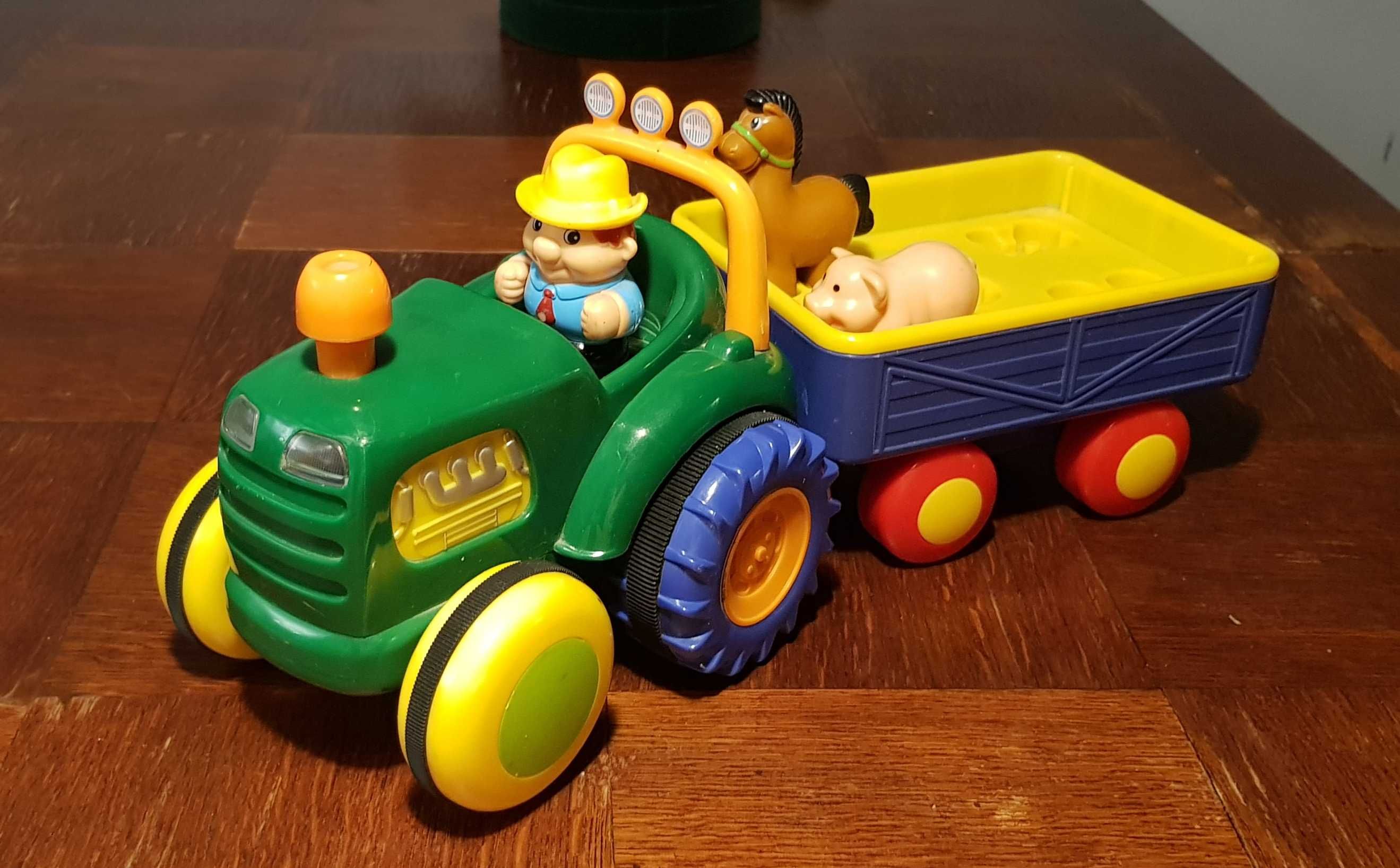 Zabawka traktor z przyczepą - wydający dźwięki, jeżdżący, z figurkami