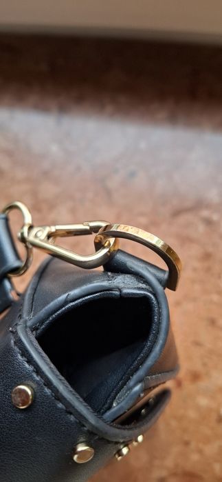 Czarna listonoszka Reserved