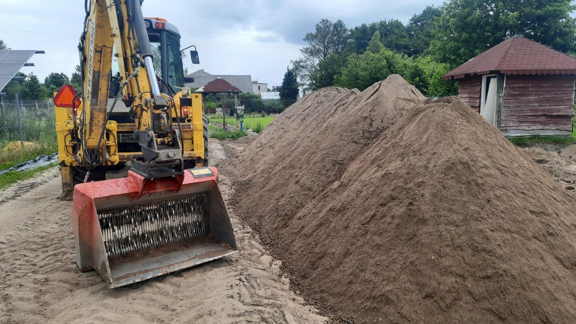 Prace ziemne wynajem koparek ciągnika z przyczepą budowlaną