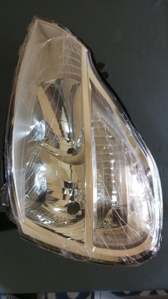 Farol Renault modus