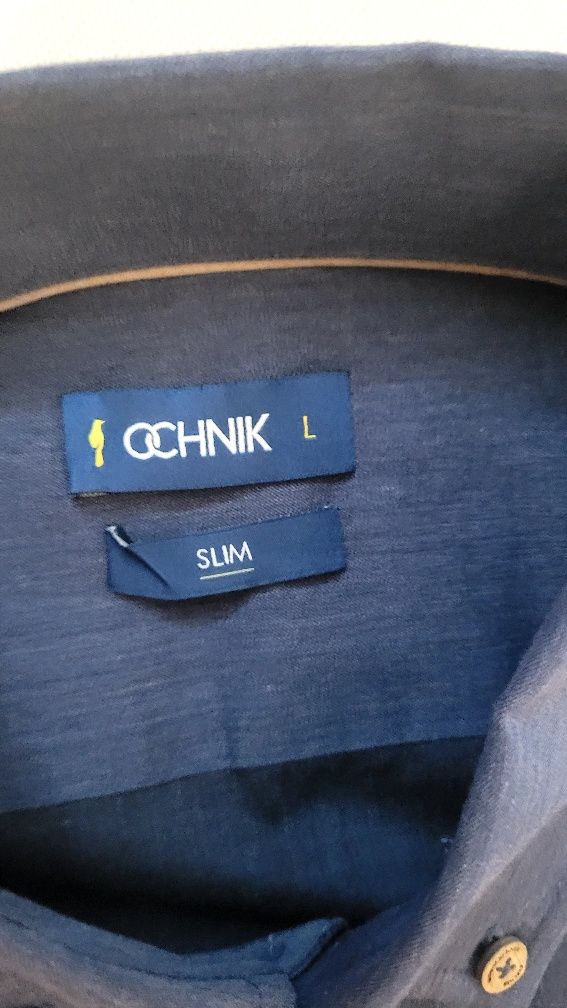 Nowa koszula meska Ochnik Slim, rozm.L. Długość 80 c, klatka 57 cm.