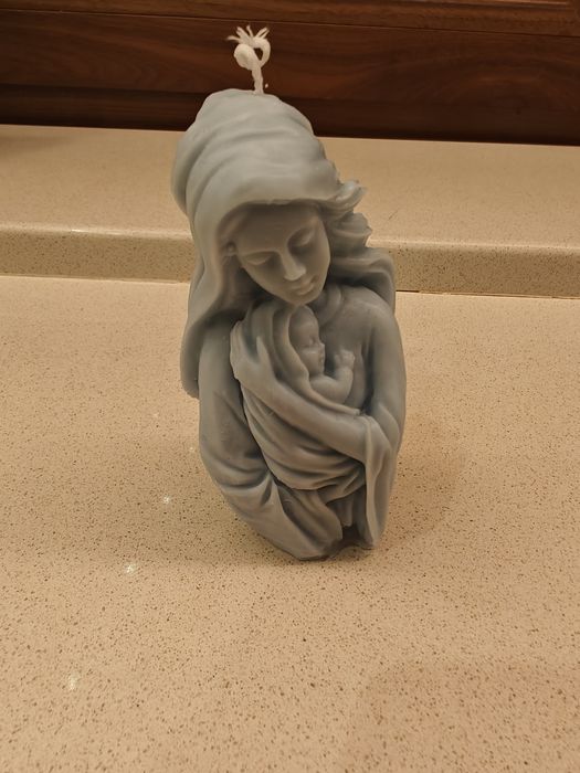 Velas com o formato da Nossa Senhor