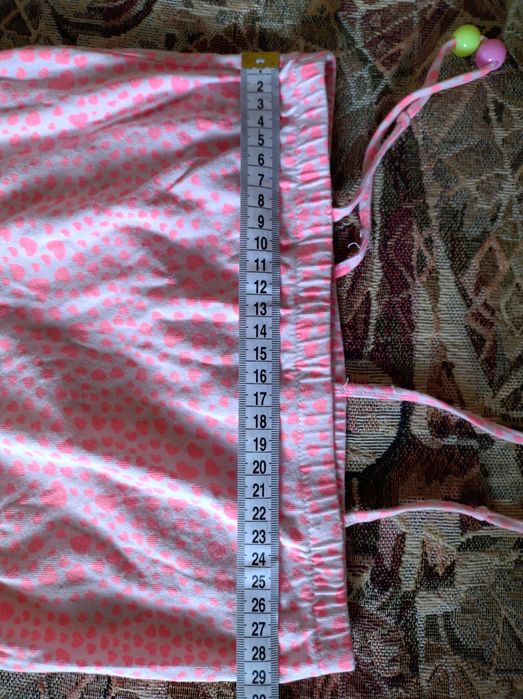 Неоново-рожевий дитячий комбінезон H&M із сердечками