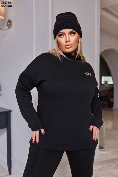 Костюми жіночі ..