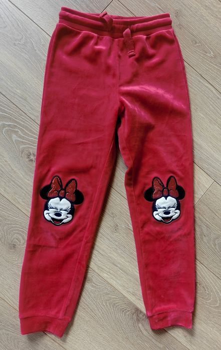 Rozm.116/122 2x spodnie welurowe: szare z cekinami, czerwone Minnie