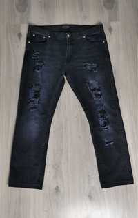 Spodnie jeansy z dziurami Alexander McQueen rozmiar XXL 2XL