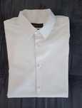 Camisa Suits Inc