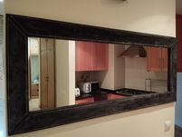 Espelho 1,40x60, moldura tipo pele/napa escura