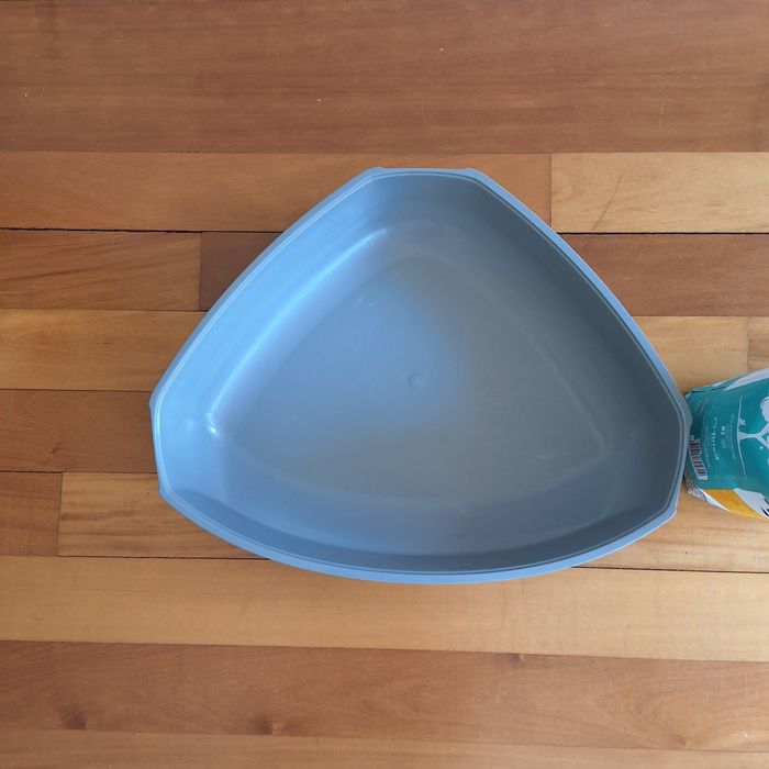 Caixa de areia de canto com areia