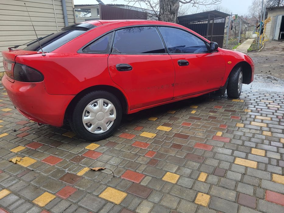 Продам Мазда323 по запчастям