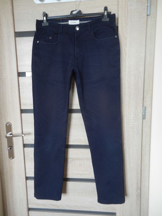 Granatowe bawełniane spodnie męskie chino r. 31