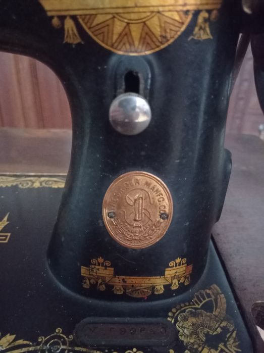 Máquina de Costura Singer
