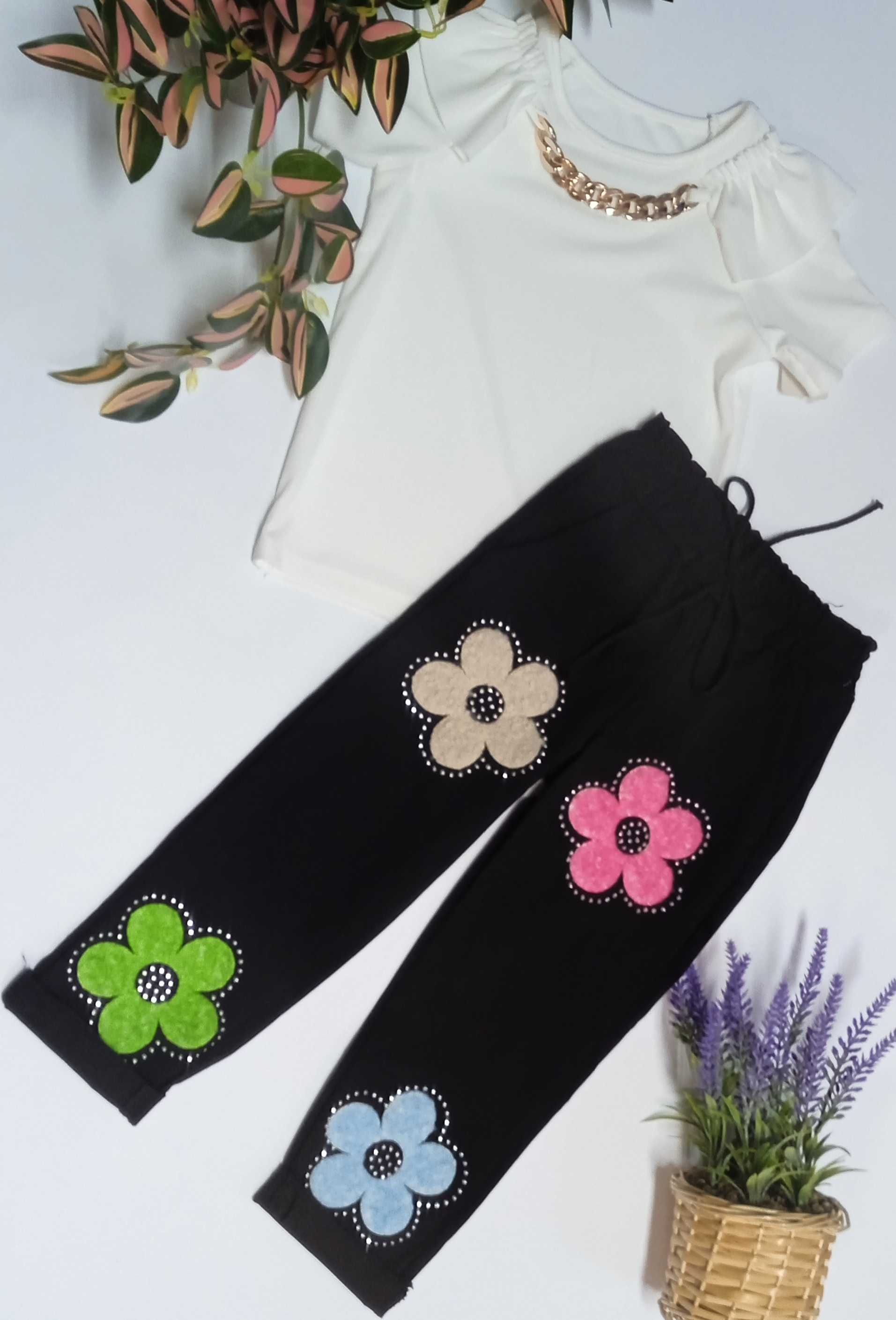 Spodnie w kwiaty dla dziewczynki rozmiar od 110/116 do 164