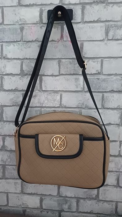 i Nowa torebka kuferek Marco Contti
Regulowany pasek z przodu kieszonk