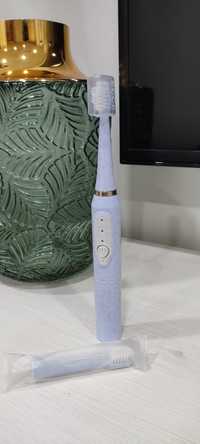 Escova dentes elétrica (pilha) + oferta de recarga - nova