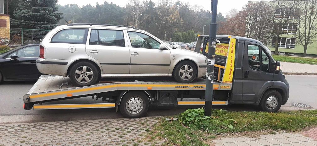 Pomoc drogowa Holowanie Transport Autolaweta  Tanio