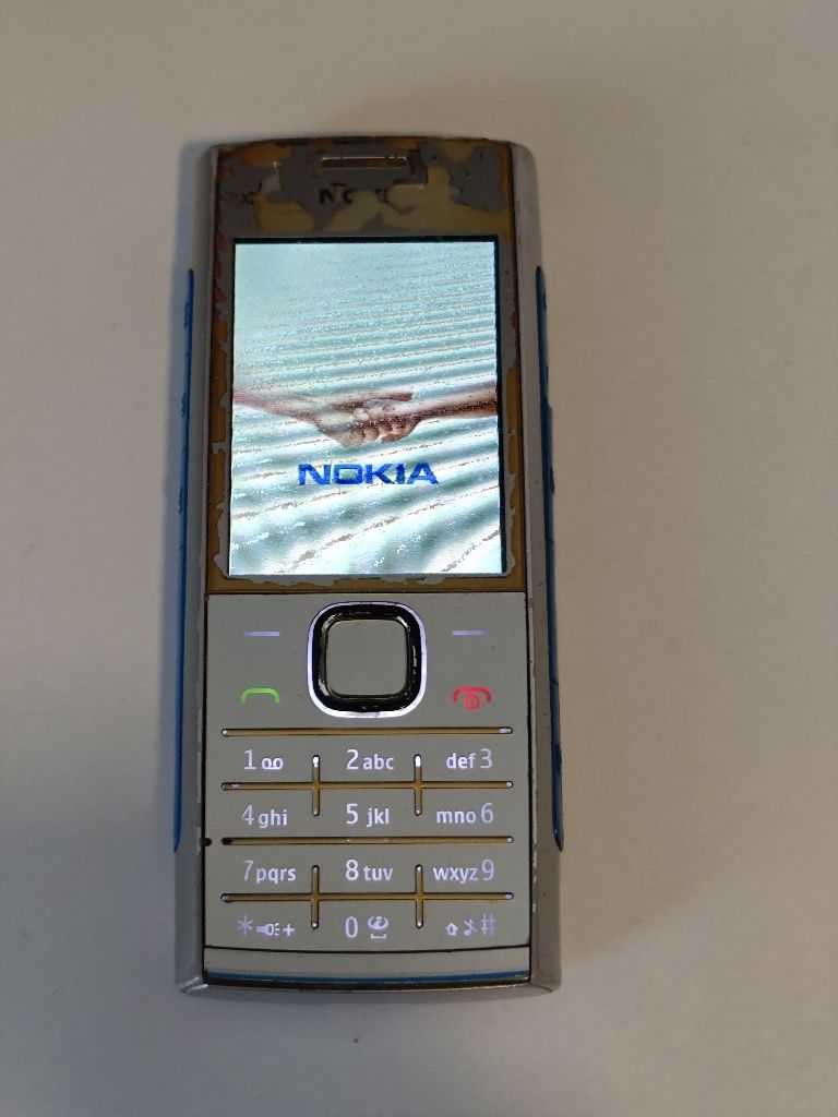 Nokia X2-00 telefon i ładowarka