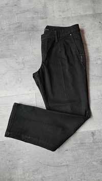Czarne spodnie MAC Jeans z lekkimi kantami 42