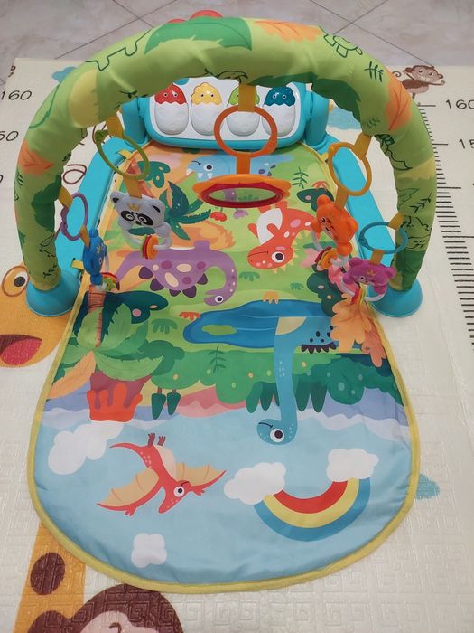 Розвиваючий килимок.