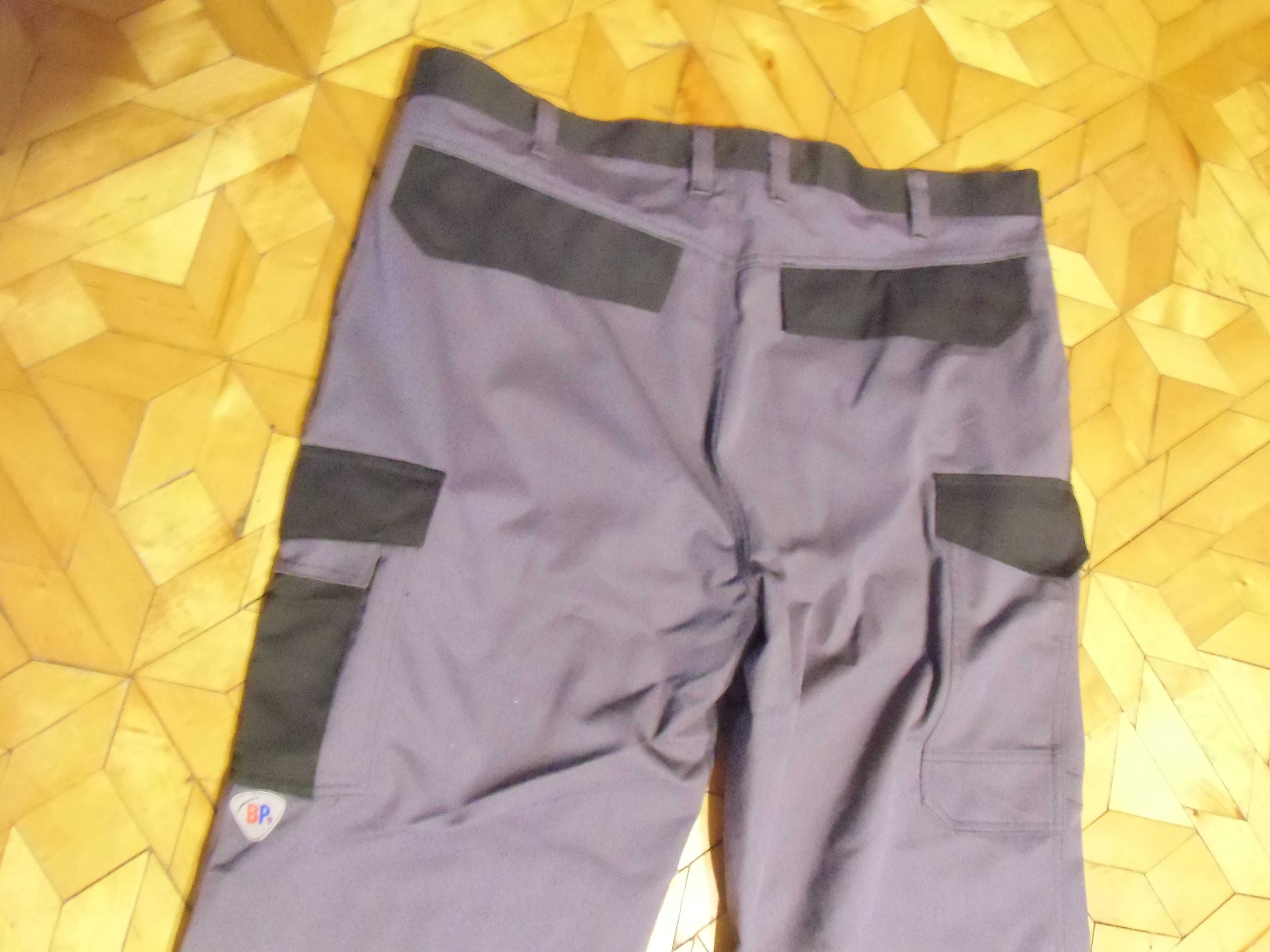 Firmowe spodnie BP dla spawacza wielofunkcyjne NOWE r 54
