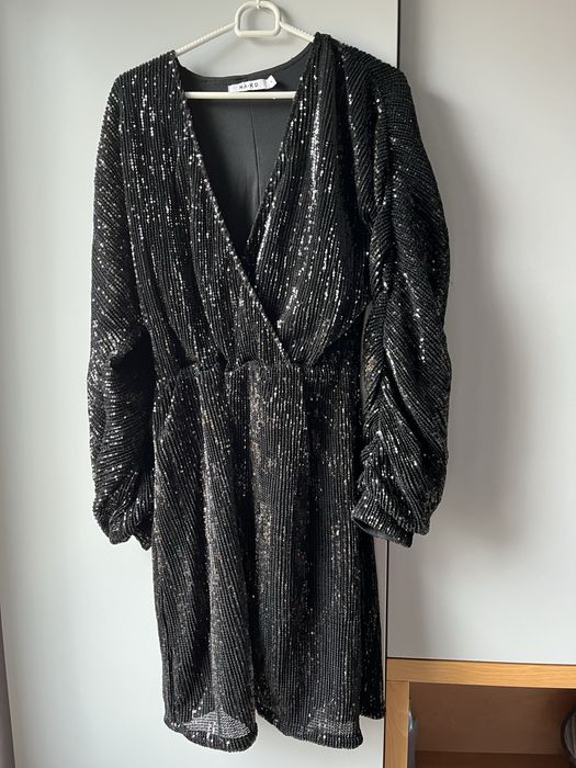 Sylwestrowo imprezowa sukienka w cekiny