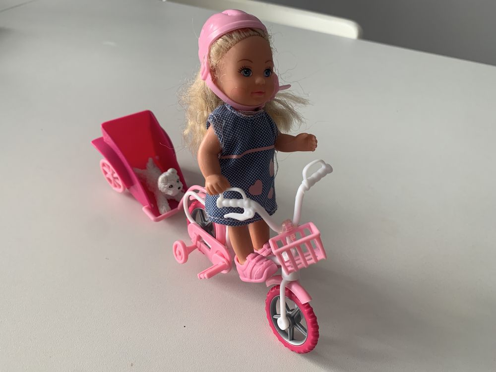 Lalka Mattel na rowerze z pieskiem