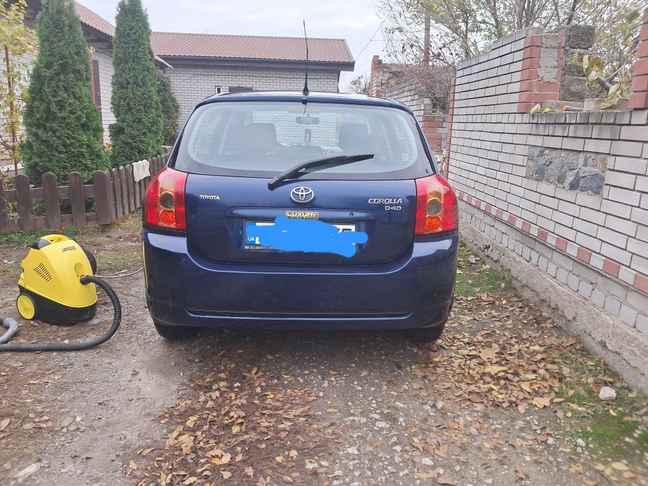 Тойота корола е120