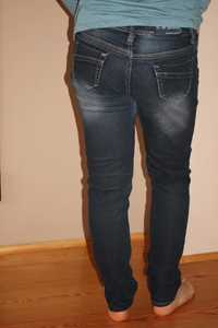 Damskie spodnie - jeansy jak nowe M