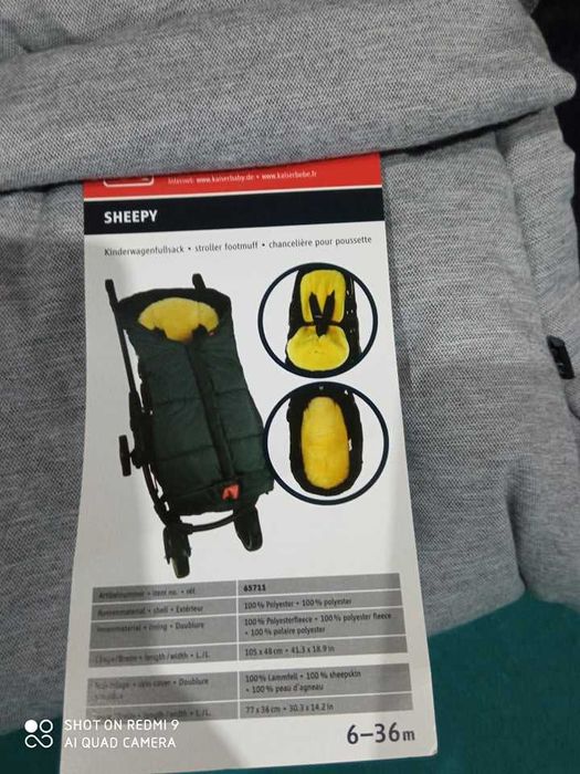 Kaiser śpiworek na nogi "Sheepy", kolor czarny wełna skora jagniecia