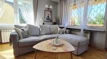 Sofa IKEA GRÖNLID + pufa ze schowkiem + 3 komplety pokrowców–jak nowa!