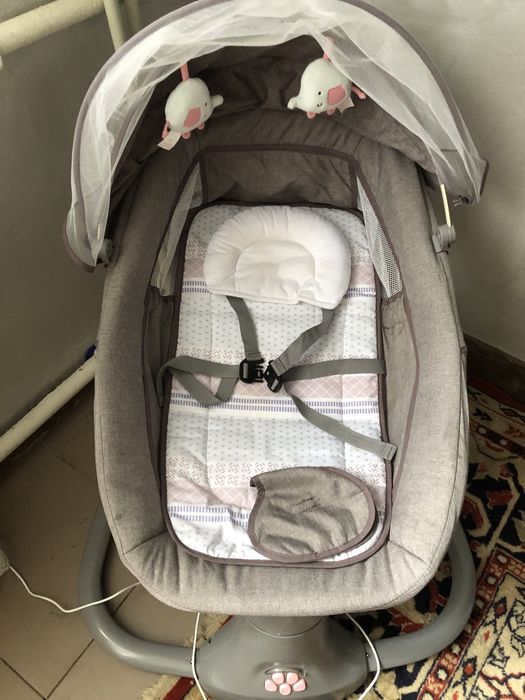 Крісло гойдалка,шезлонг,заколисуючий центр