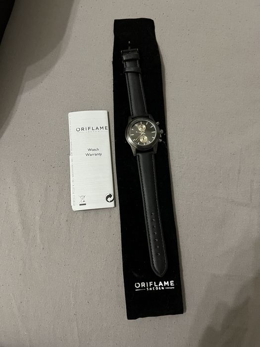 Годинник Oriflame