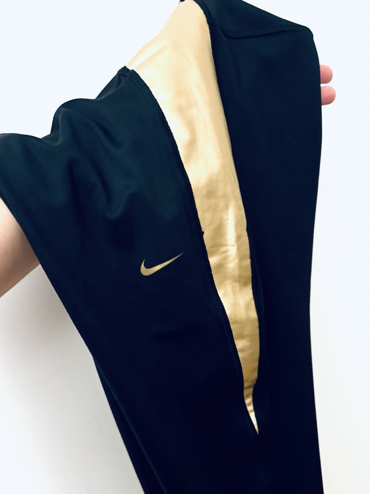 Spodnie sportowe Nike XL Dri-fit czarno zlote super stan