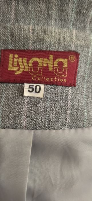 Елегантний жіночий костюм 50 розміру