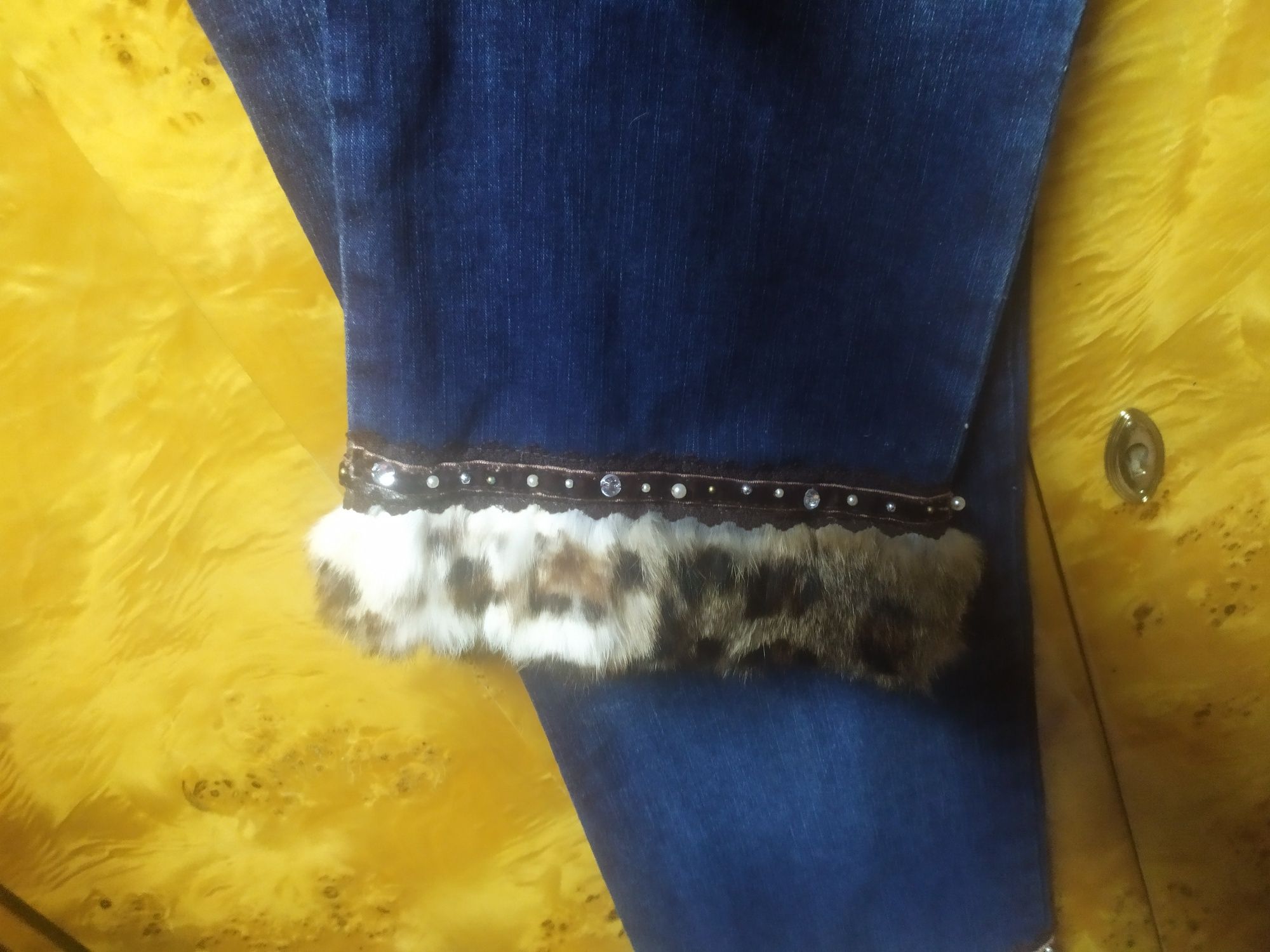 Spodnie jeansowe Jeansy z futrem w panterkę dżinsy France r. 42