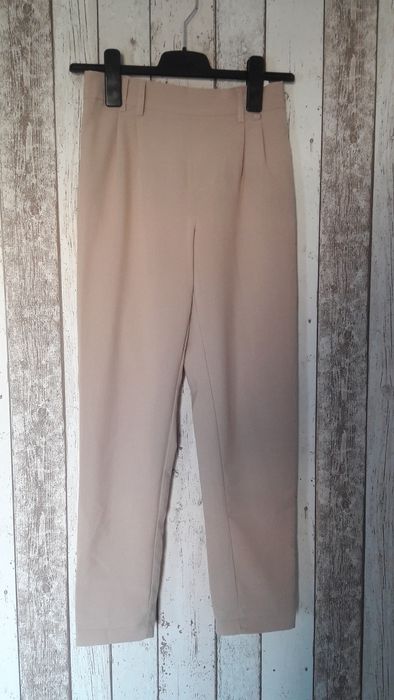 Spodnie beżowe Sinsay XXS