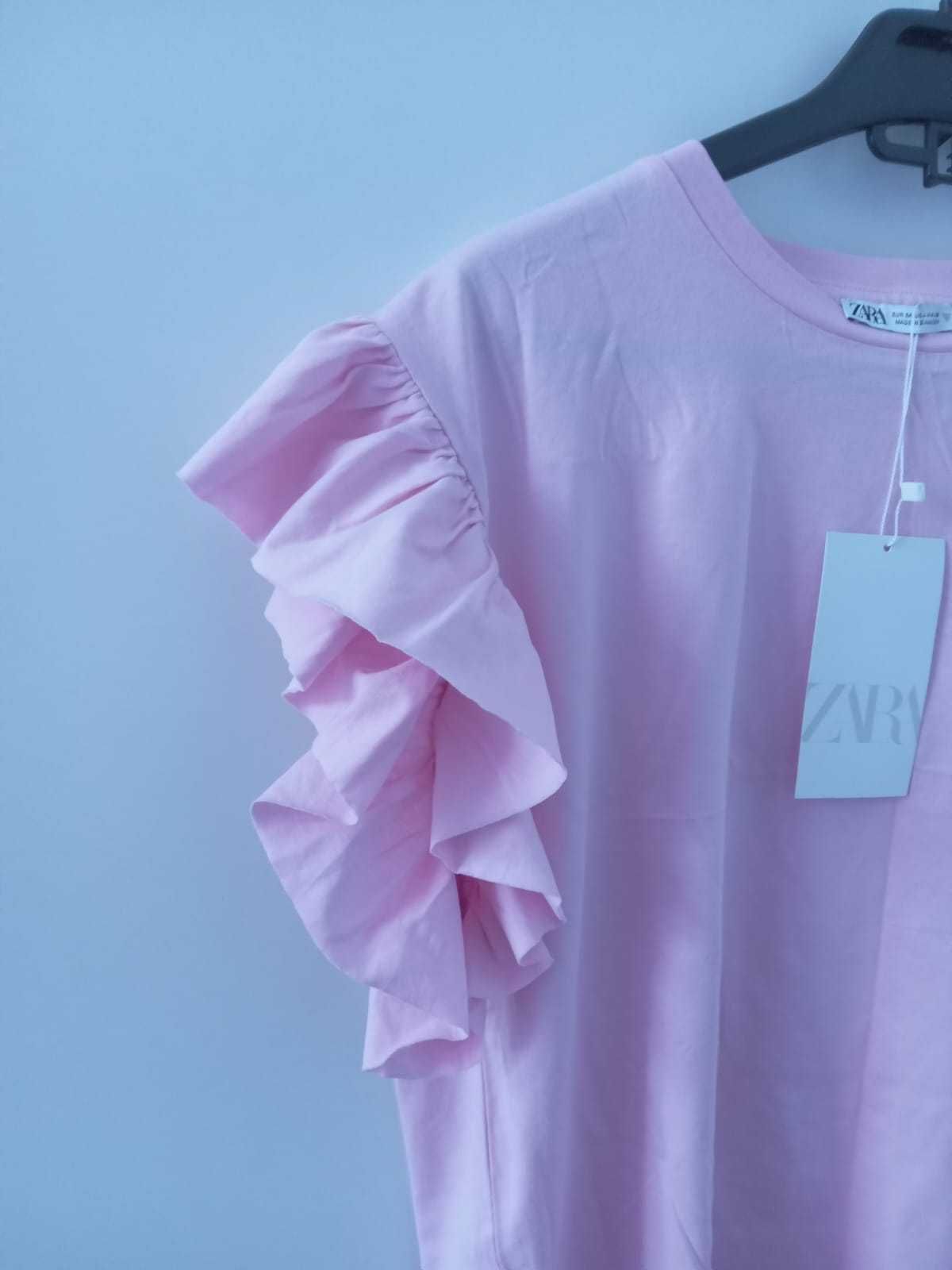 A cor é um rosa bebe muito bonito, mas que não pra ver pela foto.