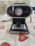 Maquina de cafe a funcionar bem