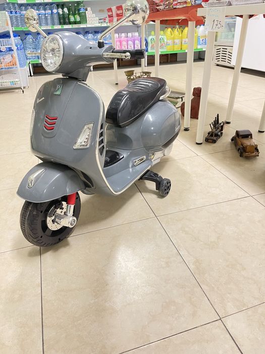 Trotinete eletrica marca vespa de crianca sem carregador