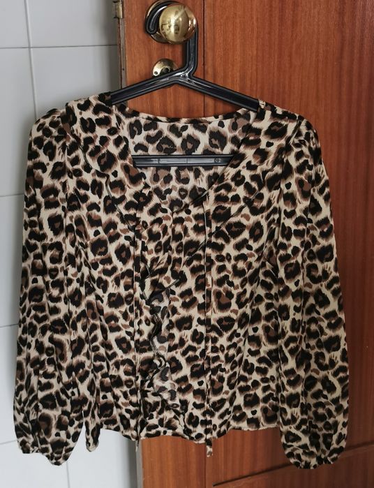 Blusa tigresa de manga comprida