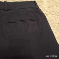 Spodnie Reserved 32 (L)