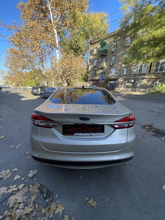 Ford Fusion Hybrid в аренду. RedRent.
