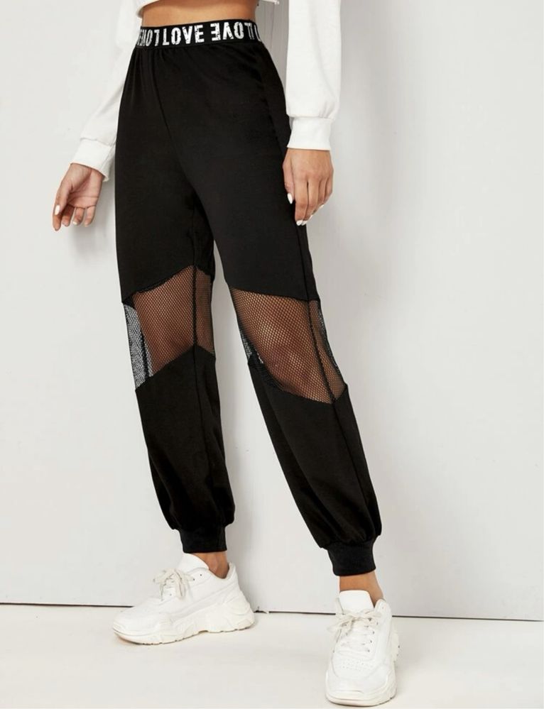 Трендові штани джогери зі вставкою з сітки