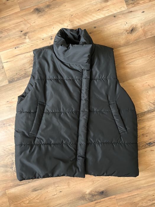 Тепла жилетка на застібці