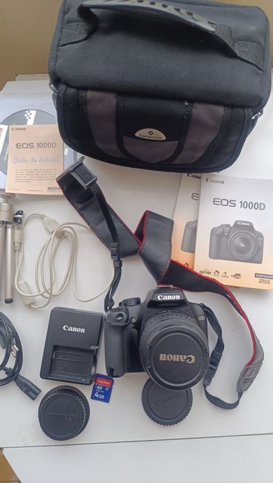 Máquina fotográfica Canon 1000D, lente, bolsa, tripé, cartão de memria