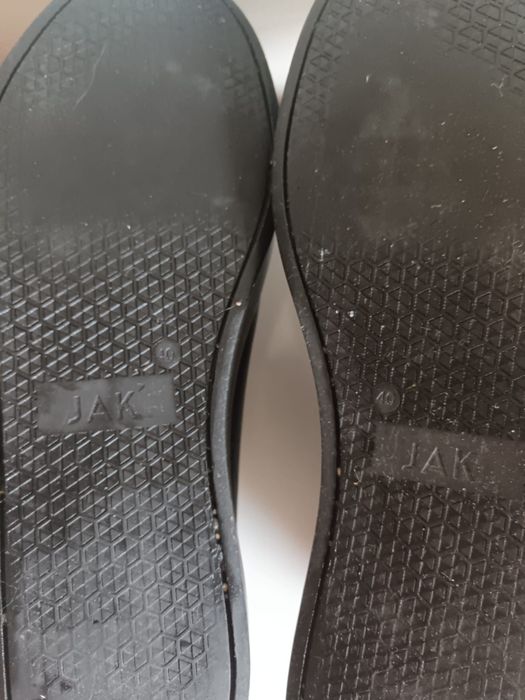 Botas pretas, homem da JAK