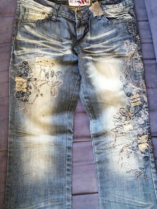 Nowe spodnie jeansy 40